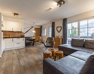 Comfortable bedroom in Luxury Tauern Suite Walchen Kaprun 1, vacation home in Piesendorf, Salzburg with stunning views.