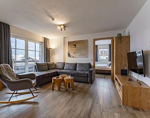 Cozy dining room in Luxury Tauern Suite Walchen Kaprun 1, vacation home in Piesendorf, Salzburg with alpine decor.