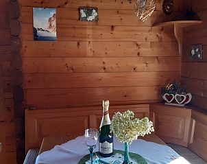 Cozy interior of Chalet Helena in Ktschach-Mauthen, Carinthia with wooden interior and attractive decorations.
