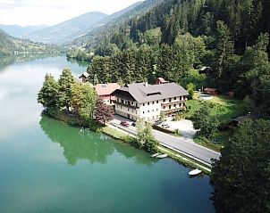 Vacation home in Feld am See, Carinthia, offers stunning views of the lake and surrounding mountains from this idyllic location.