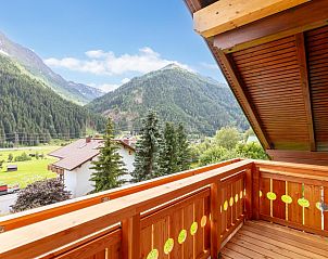 Cozy living room at Alpenlodge Pettneu Lodge 1 in Tyrol, featuring modern decor and mountain views.