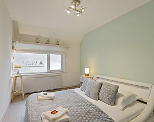 Sfeervolle slaapkamer in vakantievilla met luxe in het duinenreservaat, Oostduinkerke, Belgische kust, Belgi.