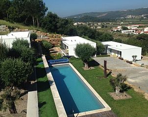 Vacation home in Cela Velha, Portugal with pool and beautiful views of the green surroundings.