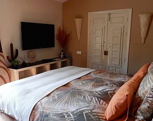 Gezellige slaapkamer in Vakantiehuis in Sedella, Andalusi, met modern interieur en rustgevende sfeer.