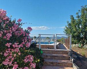 Geniet van de prachtige tuintrap bij Finca Kim, een vakantiehuis in Lliria, Valencia, Costa del Azahar, ideaal voor natuurliefhebbers.