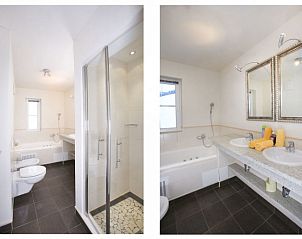 Luxe badkamer in Stunning Alpin Apartment, Lenk im Simmental, Berner Oberland, Zwitserland met moderne voorzieningen.