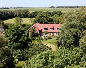 Huisje in Tetenbll, een charmant vakantiehuis omringd door weelderige natuur in Tetenbll, Sleeswijk-Holstein, Duitsland.