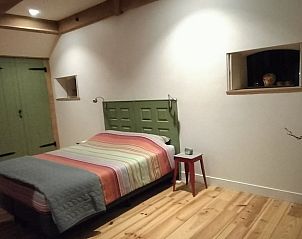 Sfeervolle slaapkamer in Huisje in Bolsward, vakantiehuis in Friesland, voor een goede nachtrust.