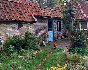 Gezellige ingang van Vakantiehuis in Oldeholtpade met landelijke charme.
