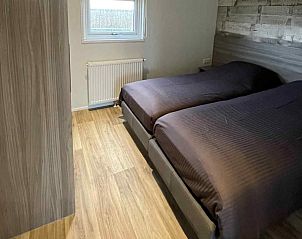 Uitzicht vanuit woonkamer van FR094 vakantiehuis op jachthaven