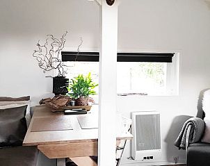 Gezellige binnenruimte in Vakantiehuis in Kootstertille, met comfortabele zitplaats in Friesland.