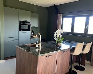 Keuken in vakantiehuis in Spanga met moderne apparatuur en gezellige sfeer.