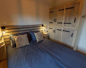 Gezellige slaapkamer in Huisje in Nij Beets, vakantieaccommodatie op het Friese platteland.