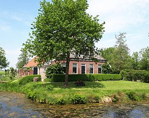 Vakantiehuis Huisje in Gersloot, gelegen in Friesland, omgeven door groene natuur en rust.