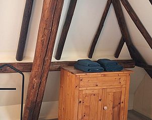 Authentieke zolderkamer in Huisje in Gersloot, vakantieaccommodatie in Friesland met rustieke uitstraling.