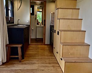 Wooden staircase and kitchen in Holiday home in Jelsum, The Frisian countryside.