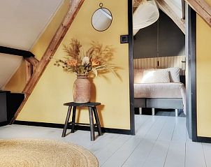 Gezellige slaapkamer in Vakantiehuis in Burdaard, ideaal voor een ontspannen verblijf in Friesland.