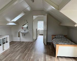 Ruime zolderkamer in Vakantiehuisje in Driel, ideaal voor kinderen.