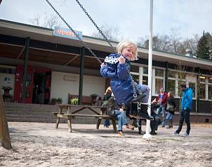 Speelplaats bij vakantiehuis in Apeldoorn, ideaal voor gezinnen met kinderen op de Veluwe.