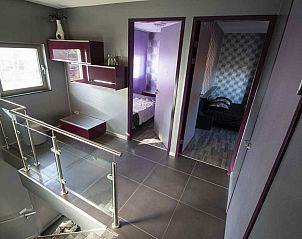 Gemtliches Schlafzimmer in Lila im Ferienhaus L303, Venray, Nord-Limburg, fr eine angenehme Nachtruhe.