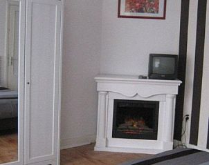 Gezellige slaapkamer in Huize 'de hommert' Hoensbroek, vakantiehuis in Zuid Limburg met open haard en comfortabele inrichting.