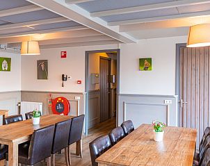 Gezellige binnenruimte in De Schuurherd en de Hoeve, ideaal voor bijeenkomsten in Hoogeloon.