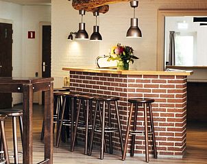 Stijlvolle bar in De Schaapskooi vakantiehuis in Hoogeloon, ideaal voor ontspanning in de Kempen, Noord Brabant.