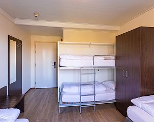 Gezellige stapelbedkamer in Voorhuis vakantiehuis, ideaal voor kinderen in Hoogeloon.