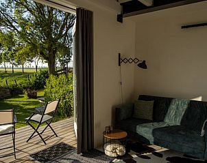 Interior of Holiday cottage in Klundert overlooking the garden, West Brabant, North Brabant.