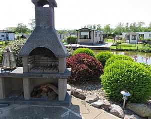Verblijf 490326 - Vakantiewoning IJsselmeerkust - huisje 143, bootje, aan het water, grote tuin en terrassen