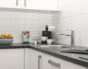 Open space in Sallandse Heuvelrug 8C vacation home, Twente, with bedroom and living room in one view.