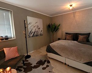 Comfortabele slaapkamer in Vakantiehuis in Lonneker, Twente, voor een goede nachtrust in het rustige Overijssel.