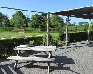 Picnic table on terrace of Holiday home in Olst, ideal for outdoor meals, Salland, Overijssel.