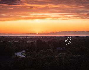 Vakantiehuis in Baars, adembenemende zonsondergang boven het landschap van Noordwest Overijssel.