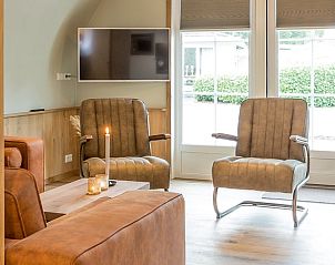 Comfortabele zithoek in Vakantiehuis in Baars, perfect voor ontspanning in Overijssel.