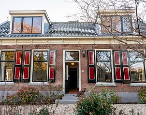 Charmant vakantiehuis in Nigtevecht, Utrecht met klassieke gevel en authentieke details.
