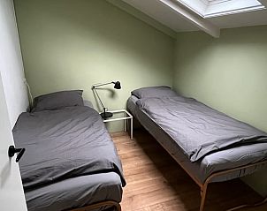 Tweepersoons slaapkamer in Vakantiehuis in Nigtevecht, Utrecht noord, met moderne inrichting.