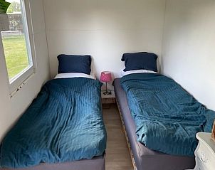 Slaapkamer in Huisje in 't Goy, vakantiehuis in Utrecht met comfortabele eenpersoonsbedden.