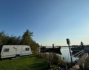 Rustiek vakantiehuis in Tull en 't Waal met prachtig uitzicht op het water en groene omgeving in Utrecht.
