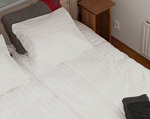 Comfortabele slaapkamer in Vakantiehuis in Oudewater, Utrecht. Ontspan in een luxe bed and breakfast.