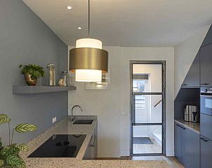 Slaapkamer met houten balken in vakantiehuis UT072, Austerlitz.