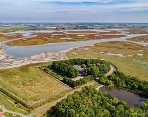 Panoramisch uitzicht op Boerenvilla.nl in Serooskerke Schouwen te midden van uitgestrekte natuur en waterlandschappen in Zeeland.