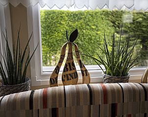 Vooraanzicht van vakantiehuis ZE648 met veranda in Ouwerkerk, Schouwen-Duiveland, Zeeland.