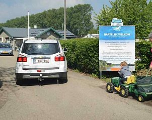 Groene tuin bij vakantiehuis ZE648 in Ouwerkerk, Schouwen-Duiveland, Zeeland.