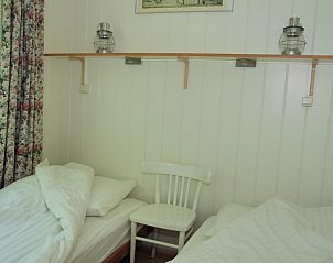 Gezellige slaapkamer met twee eenpersoonsbedden in Dishoek 6a vakantiehuis in Dishoek Walcheren.