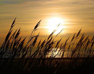Zonsondergang bij Westduin 24 vakantiehuis, Vlissingen, Walcheren, Zeeland.