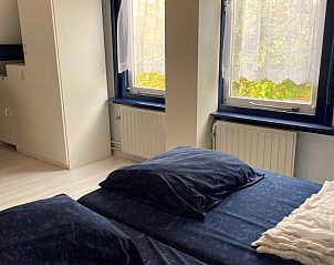 Gezellige slaapkamer in Westduin 40 vakantiehuis, Vlissingen, Walcheren met natuurlijk licht.