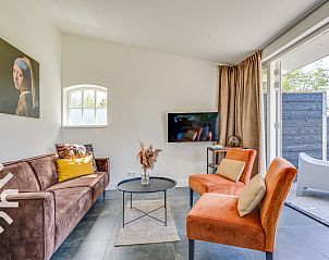 Luxe badkamer met hoekbad in vakantiehuis ZE059 in Veere, Walcheren.