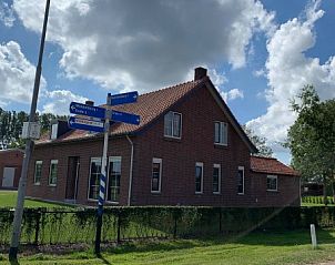 Charmante gevel van De groene specht in Eede, Zeeuws-Vlaanderen, een uitnodigend vakantiehuis in het mooie Zeeland.