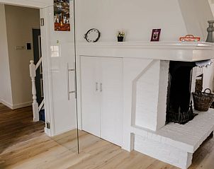 Sfeervolle open haard in Vakantiehuisje in Hansweert, Zuid-Beveland, Zeeland.